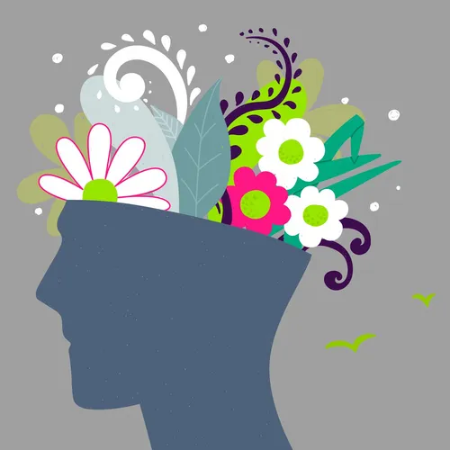 silhouette of head with flowers coming out on top