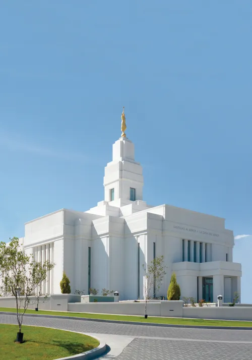 A side view of the Quetzaltenango Guatemala Temple, with a partial view of the entrance and grounds of the temple.