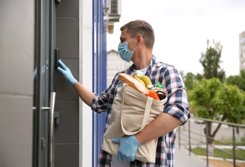 man delivering groceries