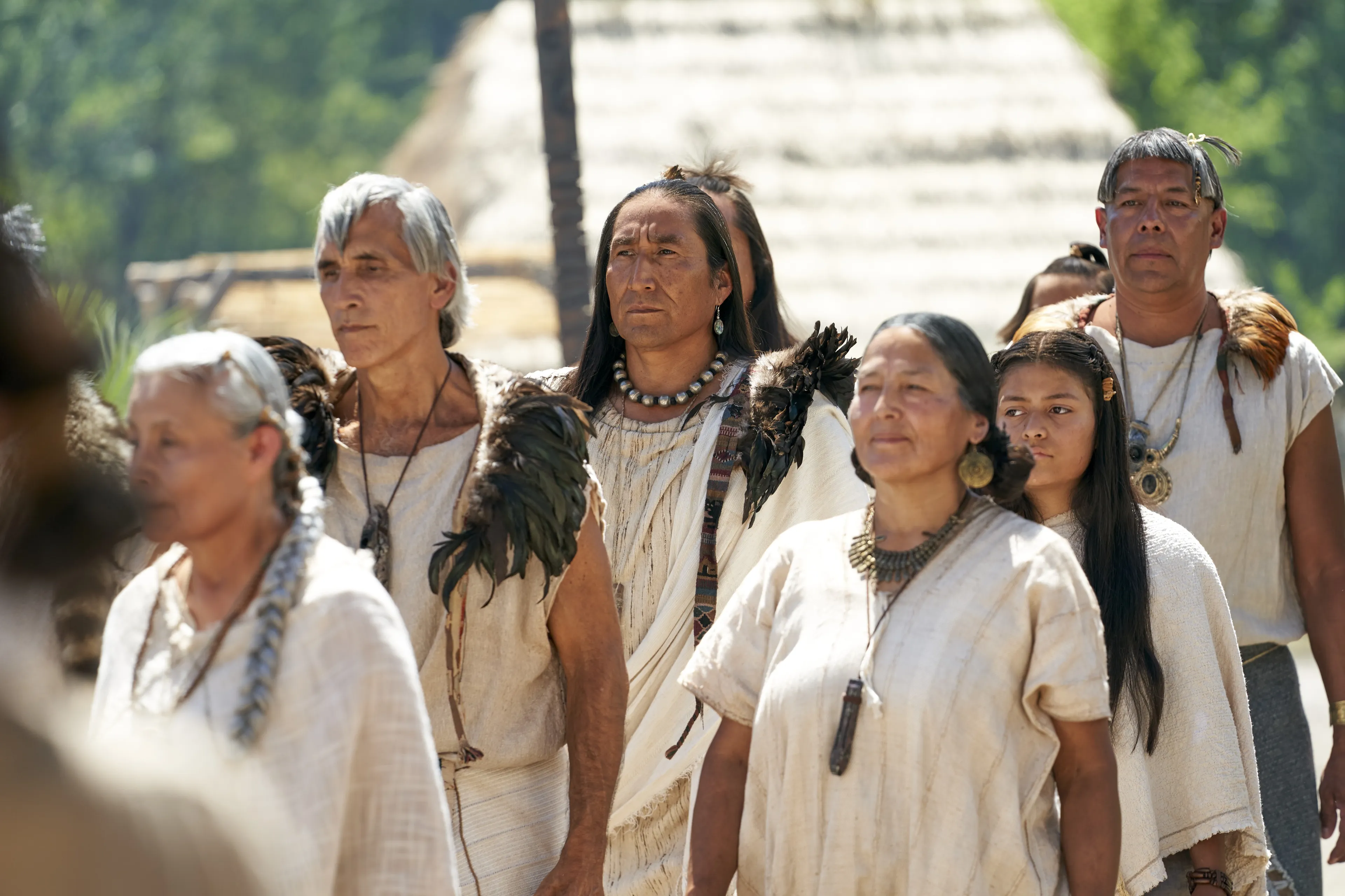 Lamanites watch as King Lamoni and his procession walk past in the land of Ishmael.
