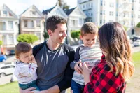 A family of four with two small boys