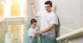 boy being baptized