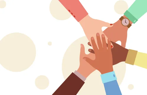 several hands reaching to the middle