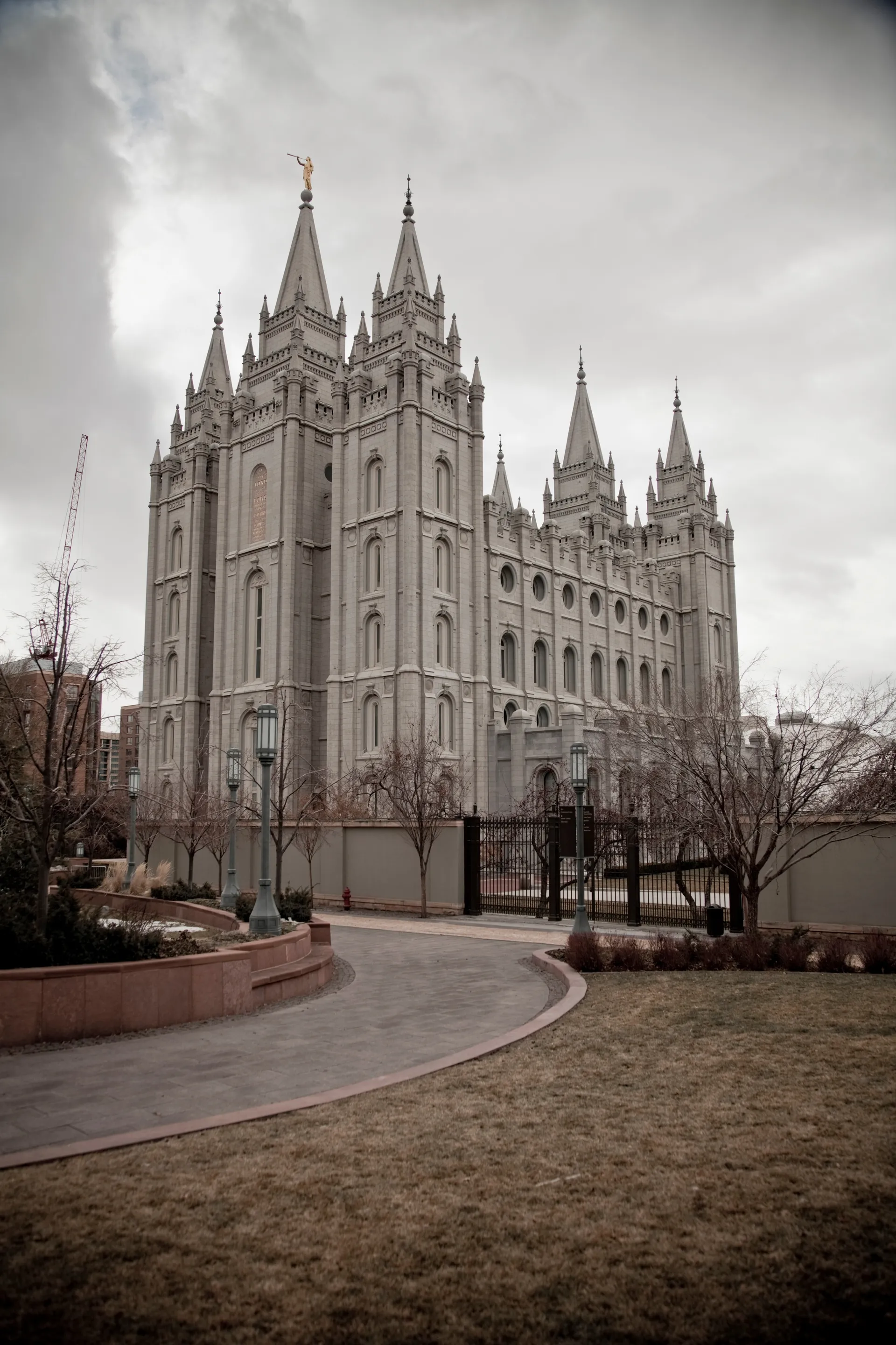 The Salt Lake Temple in the winter, including scenery.