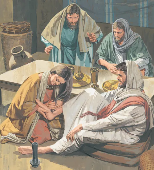 woman washing Jesus’s feet
