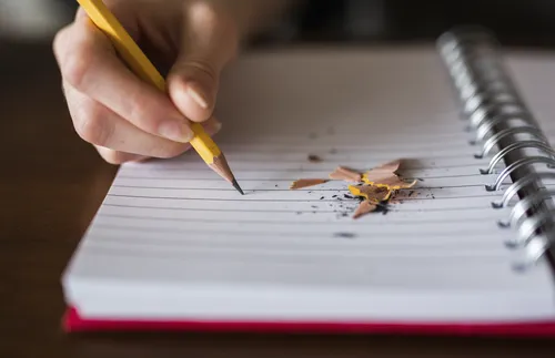 Writing in a notebook