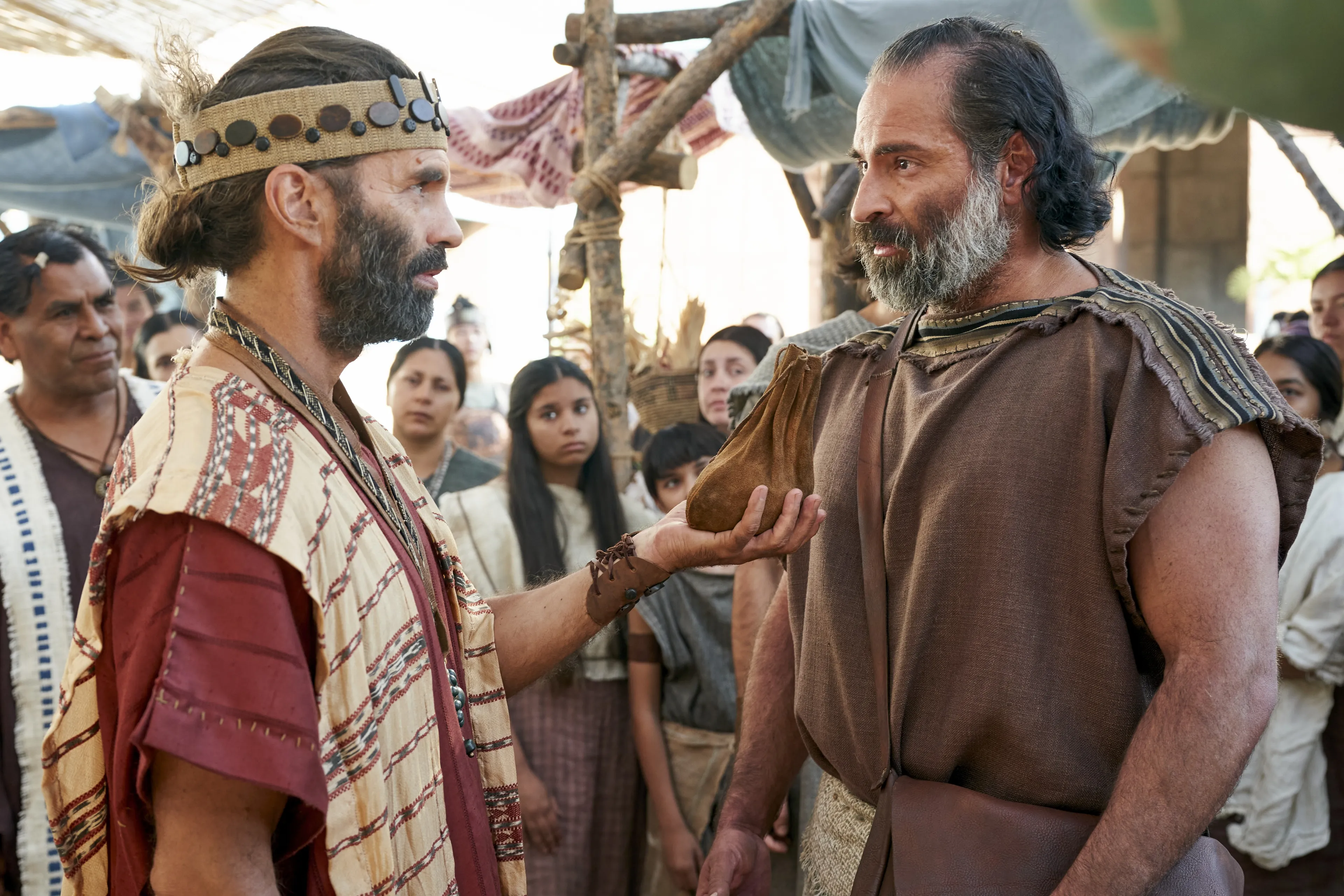 Zeezrom seeks to tempt Amulek with money in the city of Ammonihah.