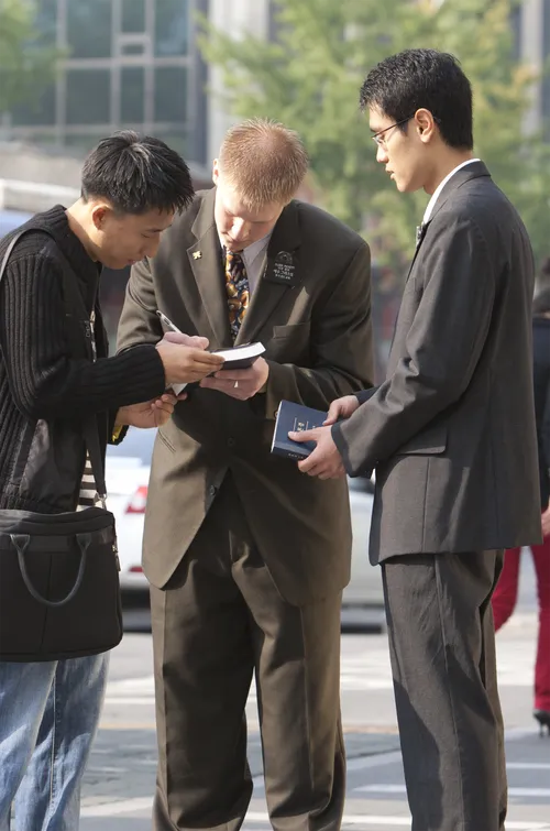 young missionary elders with man
