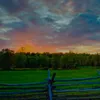 farm and trees at sunrise