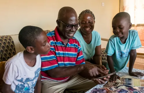 family looking at photos