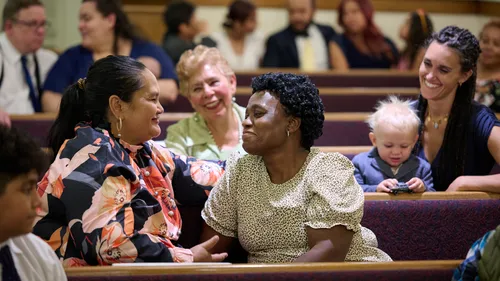 Sitting with friends at church