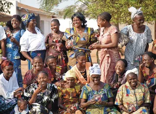 African sisters in traditional dress