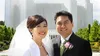 newly married couple in front of a temple