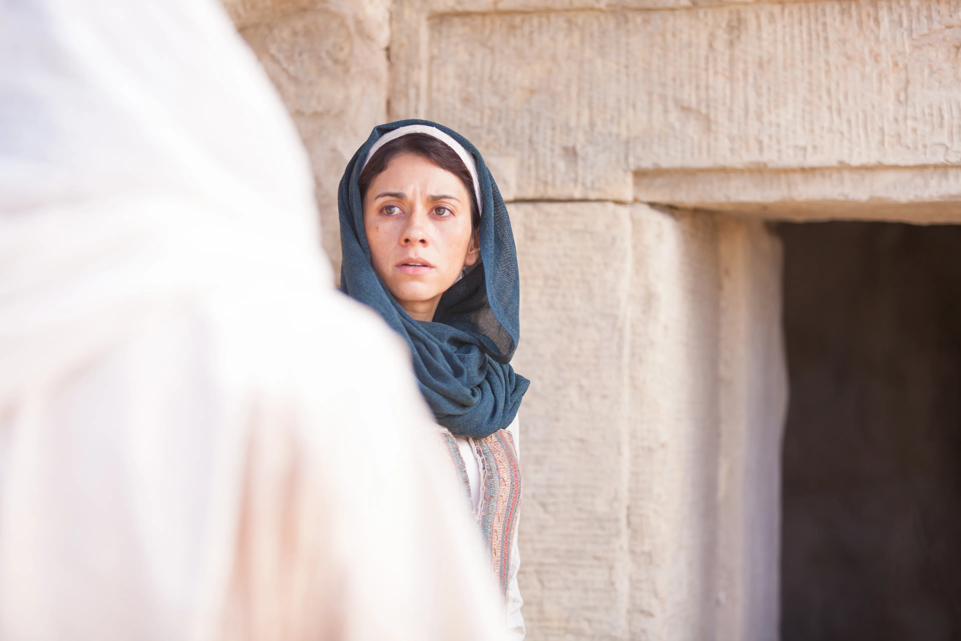 Mary Magdalene encountering the resurrected Christ at the empty tomb.