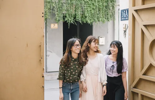 Young adult women walking together