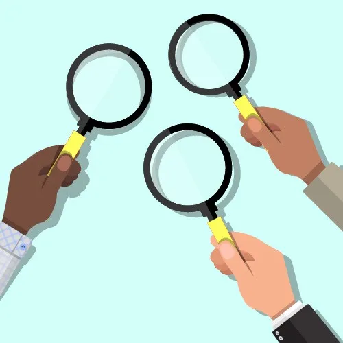 three hands holding magnifying glasses