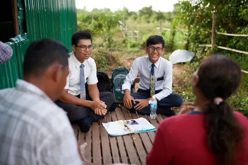 Missionaries teaching a couple