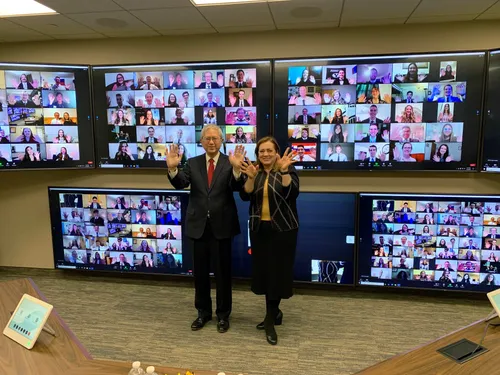 Elder and Sister Gong waving