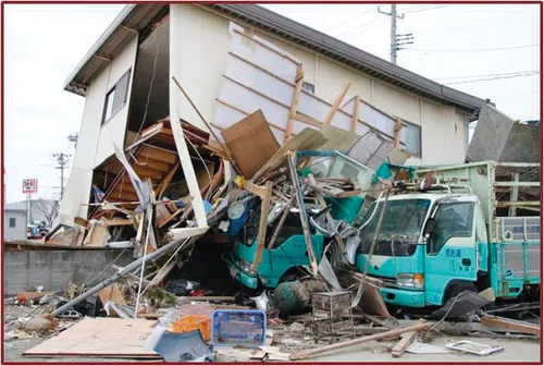a house damaged by a tsunami in Indonesia