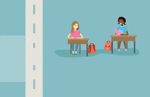 schoolgirls sitting at desks