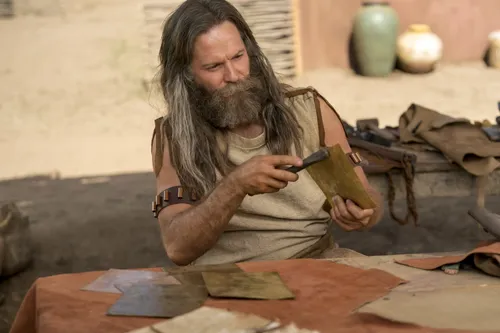 Jacob creates metal plates.