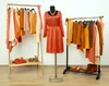 orange dress on mannequin