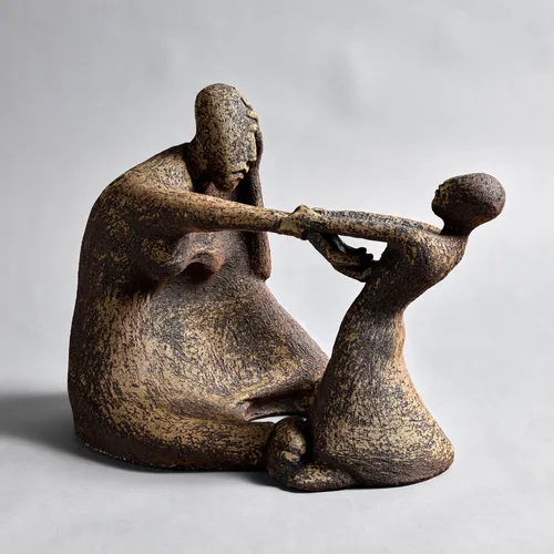 child pulling on a mother’s hand