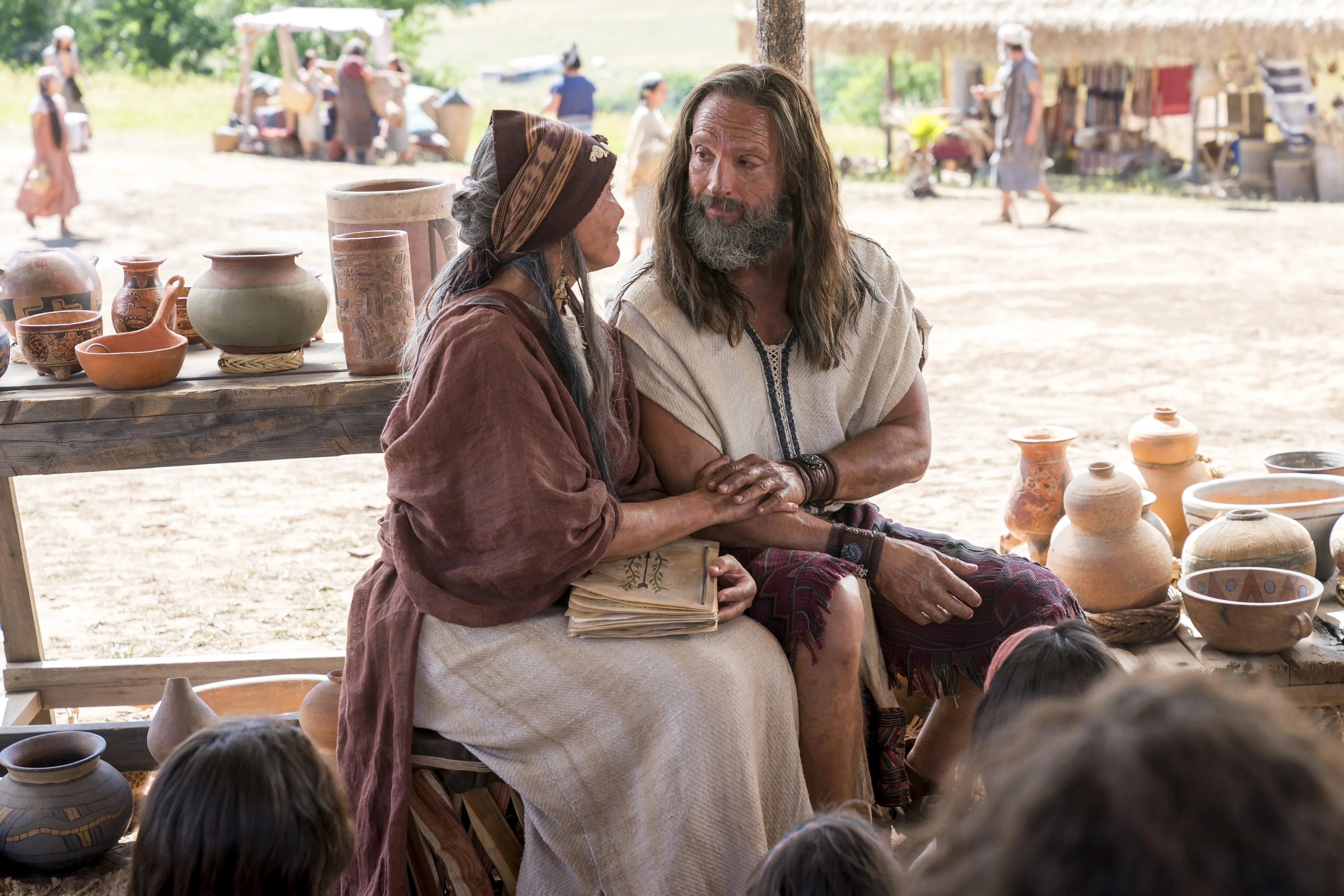 Nephi and his wife teach the people about baptism and the doctrine of Christ.
