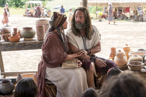 Nephi and his wife teach the people about baptism and the doctrine of Christ.