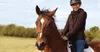 young woman on a horse