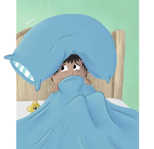Boy in bed looking scared