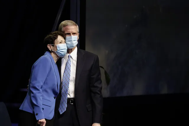 Elder David A. Bednar of the Quorum of the Twelve Apostles and his wife, Susan, stand together in the Marriott Center at Brigham Young University on January 19, 2021, before Elder Bednar spoke to students.