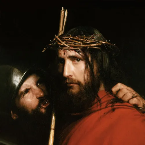 Jesus wearing a crown of thorns and being mocked by soldier