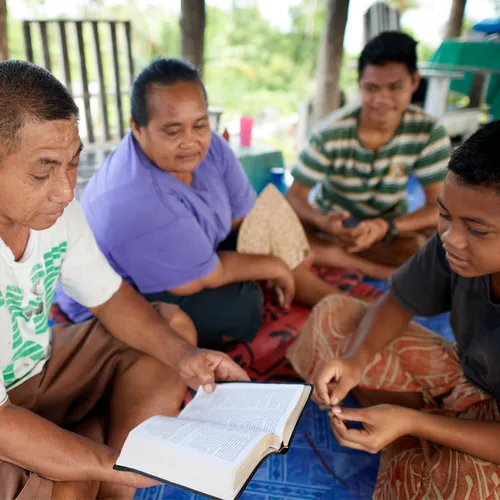 family studying scriptures