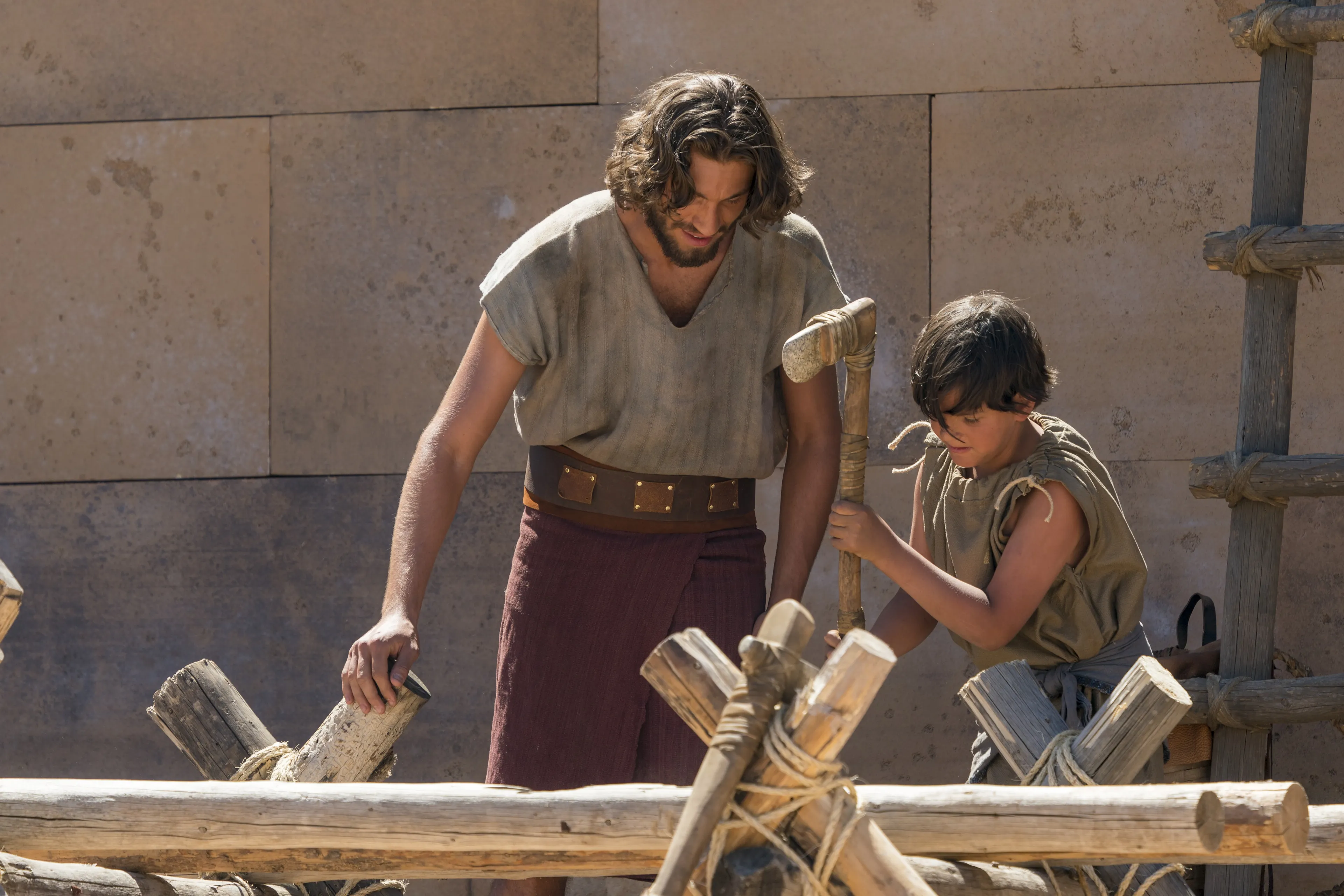 Various Nephites come together to work on building the temple in the Land of Nephi.