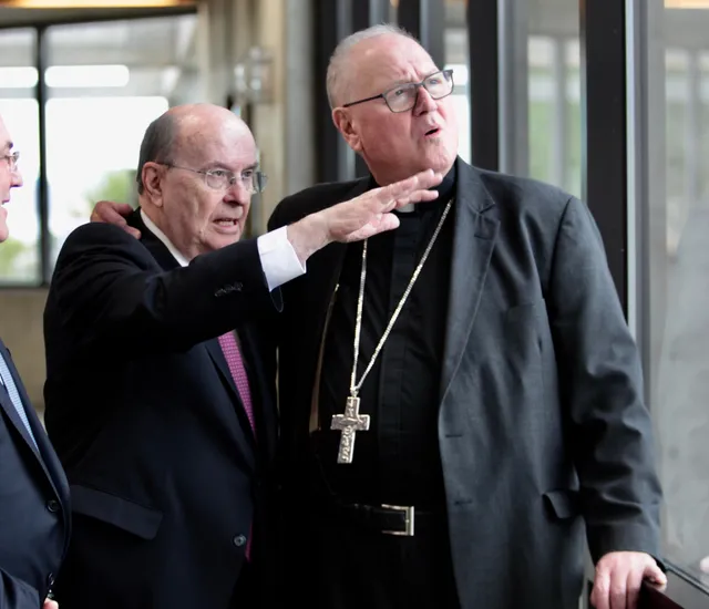 Timothy Cardinal Dolan and Elder Quentin L. Cook at the Freedom Festival