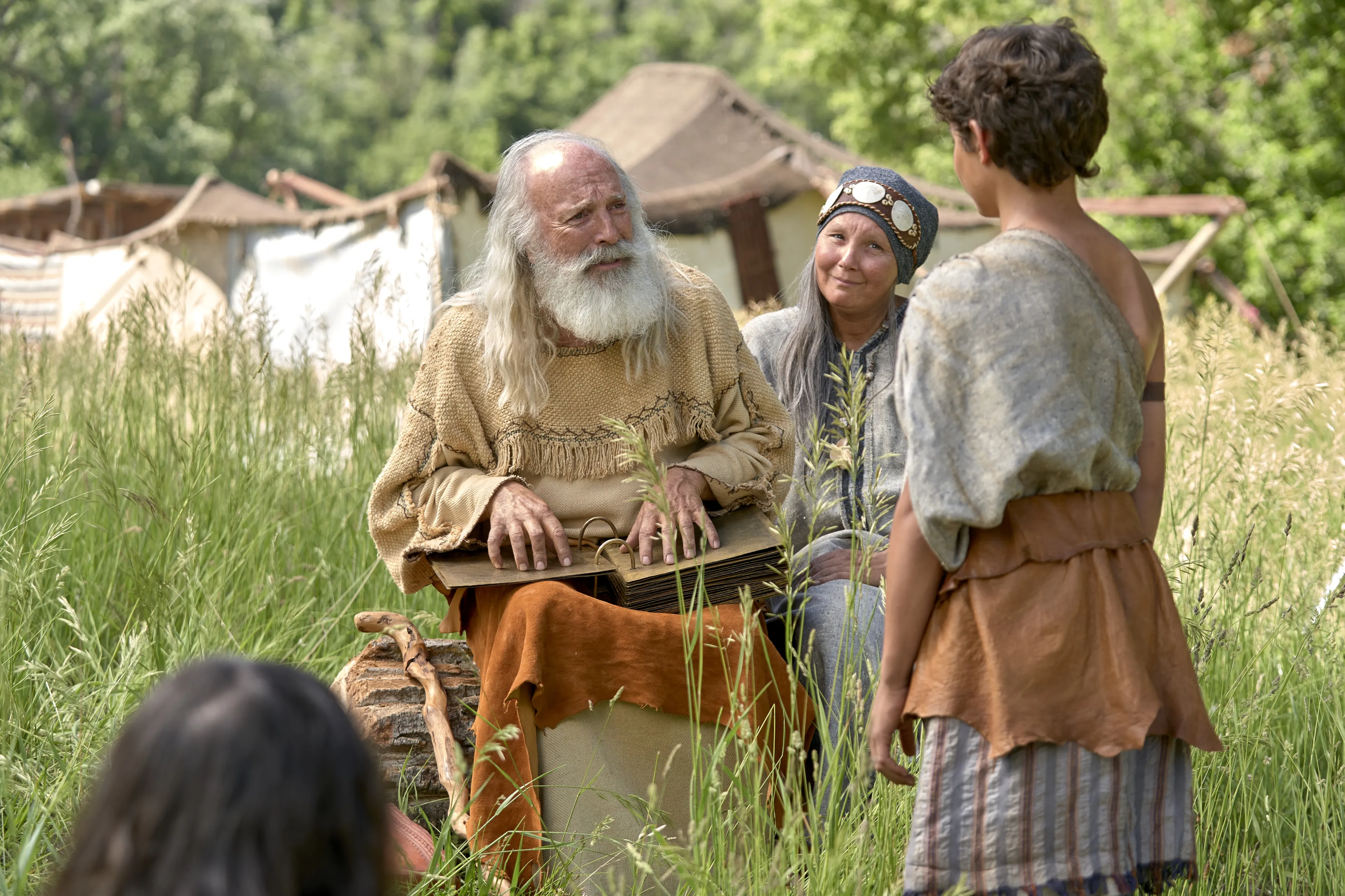 Lehi teaches Joseph from the plates of brass.