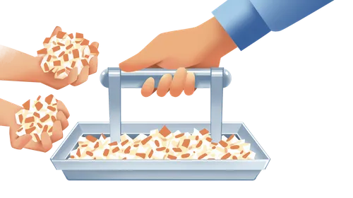 boy grabbing fistfuls of bread from tray