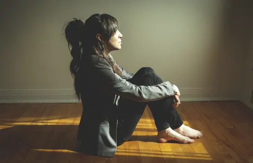 Woman looking into light