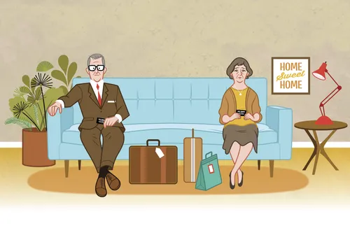 senior couple sitting on couch and looking concerned