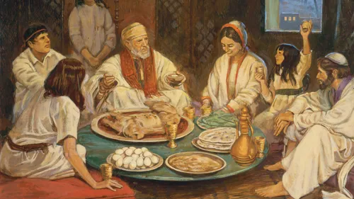 a family partaking of a Passover meal