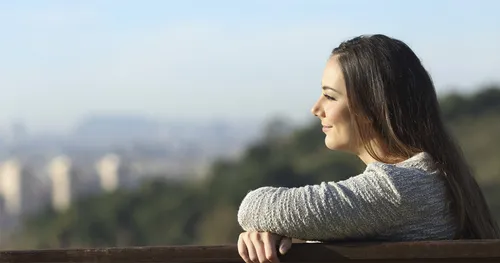 young woman pondering