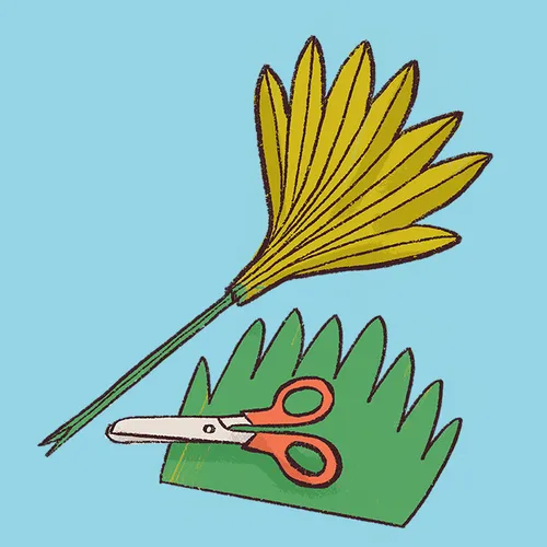 paper palm leaf and scissors
