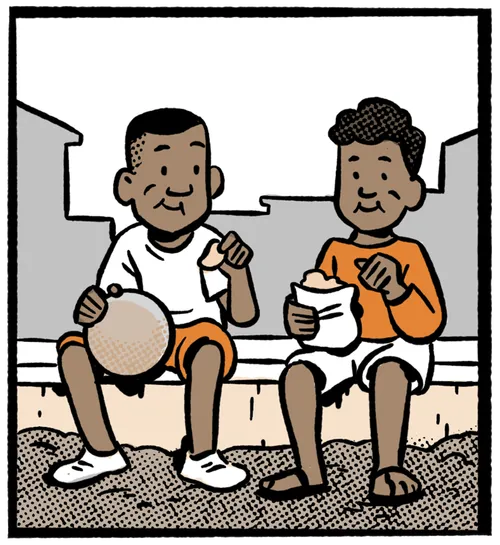 Two boys sitting and eating