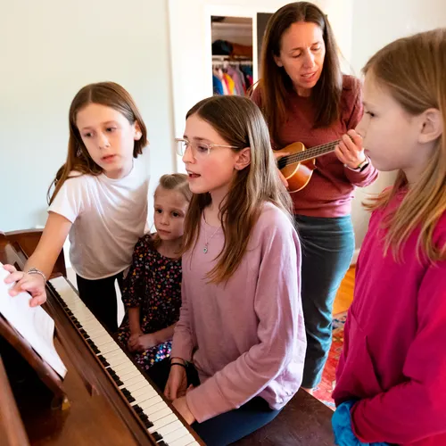 family singing and playing music