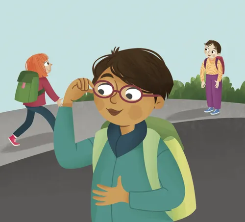 Boy wearing glasses in the school yard