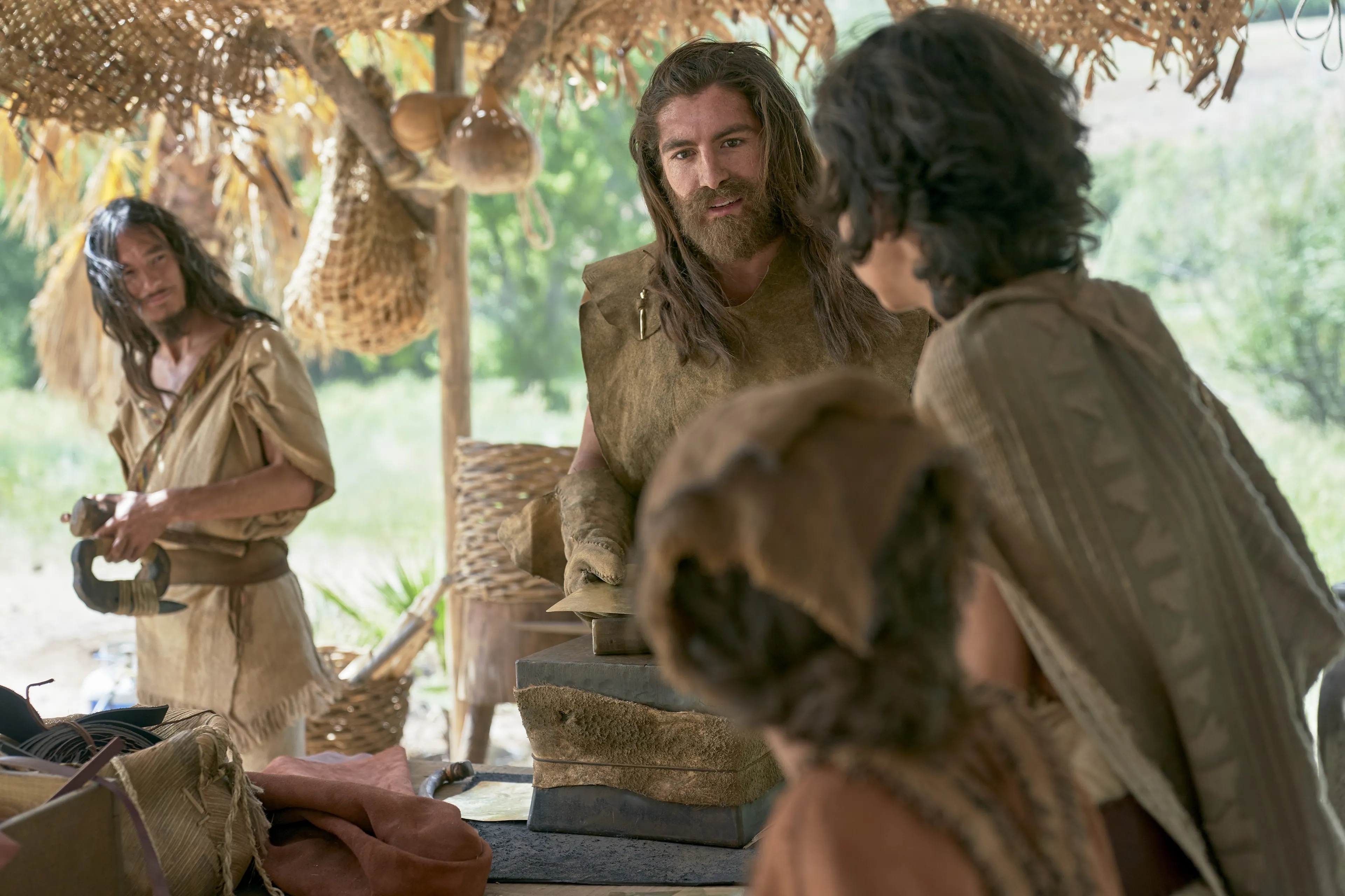 Nephi and Sam create metal plates.