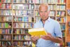 man holding a book