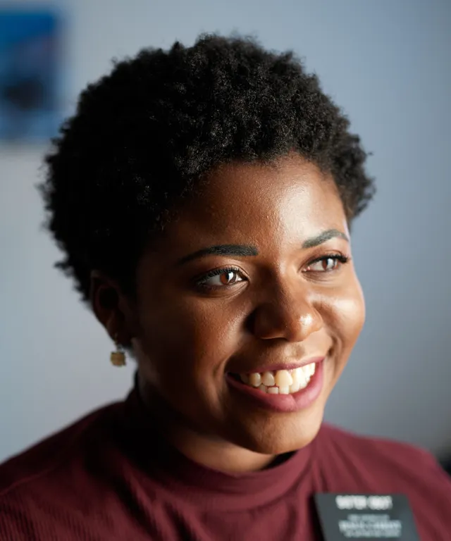 Various sister missionaries model appropriate dress and attire. They are wearing approved shirts. They appear to be talking to other people nearby.