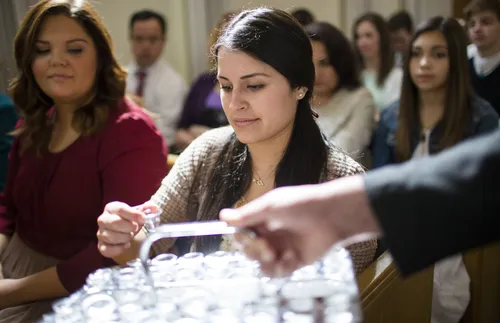 woman taking the sacrament
